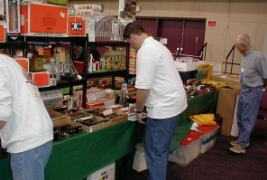 Buyers examining some of the trains my father and I took to a show in California.